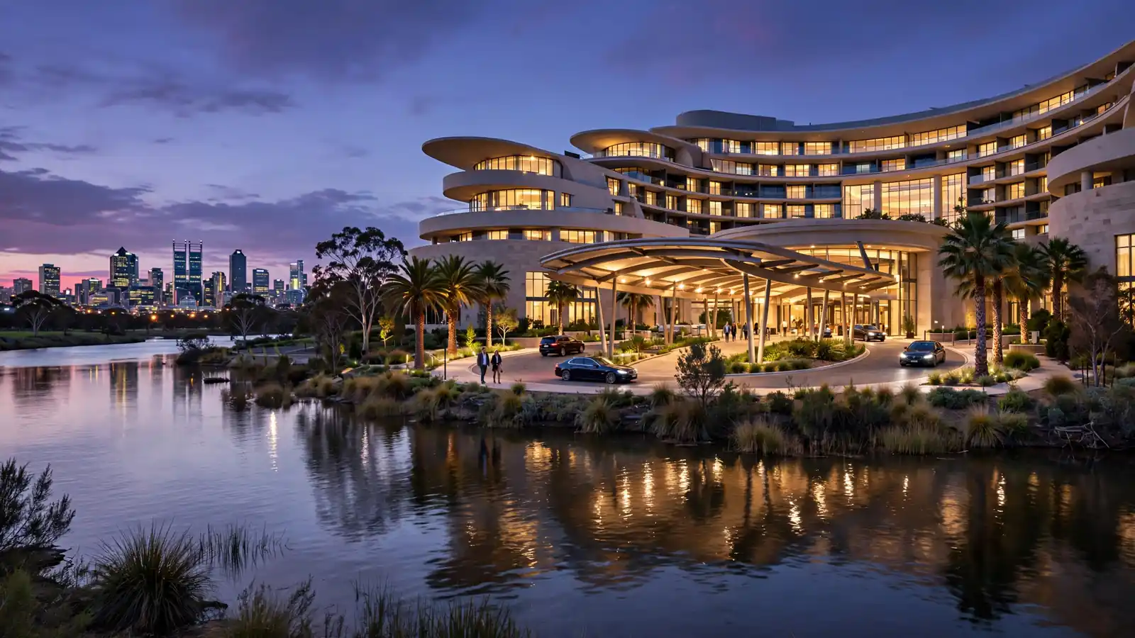 Luxury casino resort in Perth illuminated at twilight along the Swan River